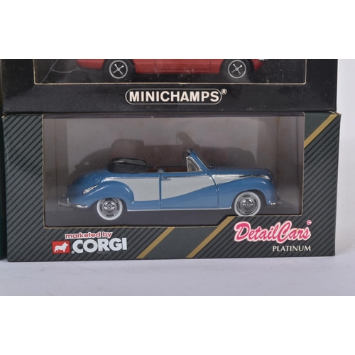 244 - A collection of x4 assorted 1/43 scale precision boxed diecast model cars comprising; Minichamps Ope... 