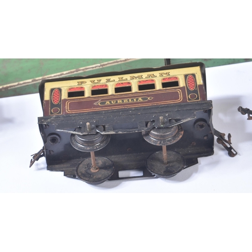 249 - A collection of vintage O gauge tinplate clockwork model railway trainset locomotive engines, wagons... 