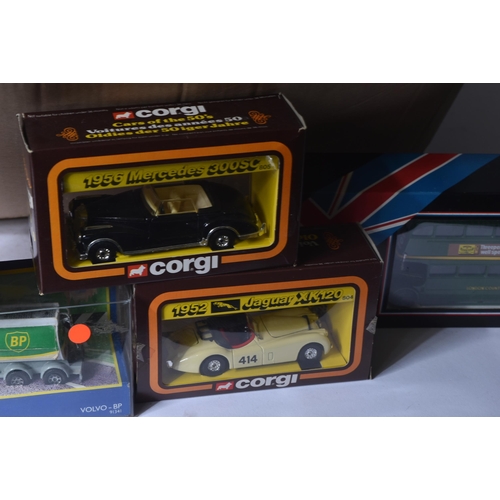 256 - A large collection of assorted boxed diecast models of various scales and makers to include; Corgi, ... 