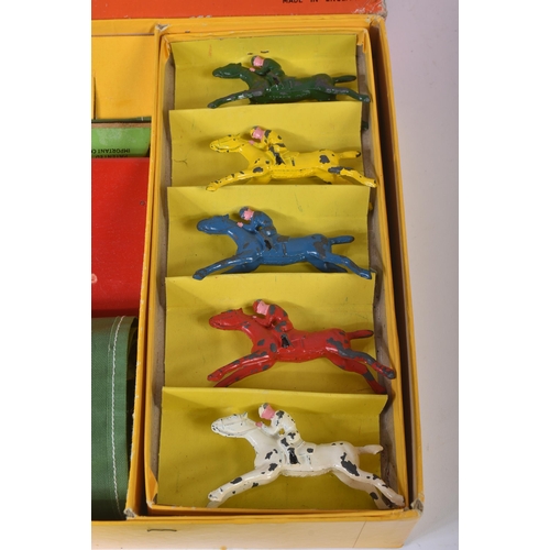 262 - A vintage Chad Valley ' Escalado ' tabletop Horse Racing game with cast metal horses, race track and... 