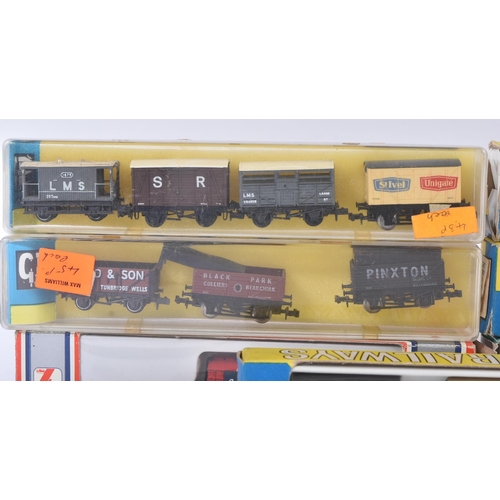 271 - A collection of assorted N gauge model railway trainset locomotive rolling stock wagons by makers Li... 