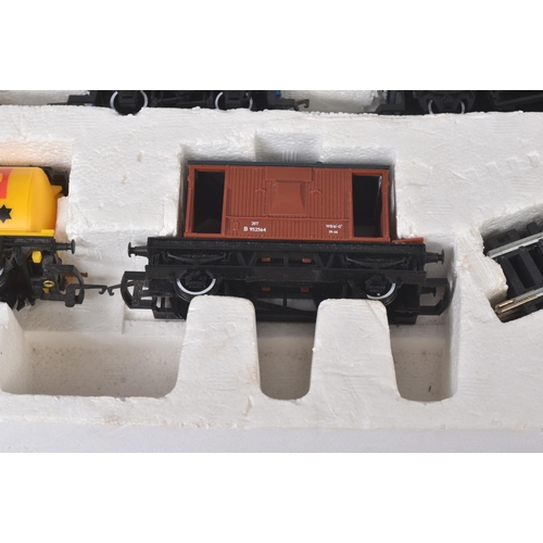 279 - An original Hornby 00 gauge model railway electric trainset No. R672 Industrial Freight. The set con... 