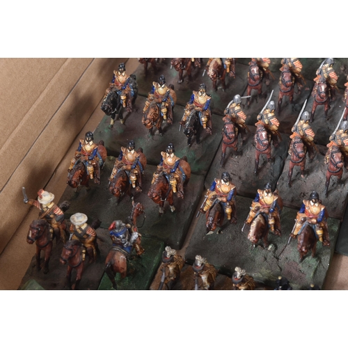 28 - A large collection of vintage hand painted lead toy soldier figurines. Largely horse back mounted ca... 