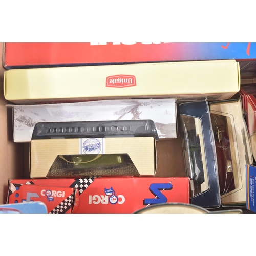 283 - A collection of assorted boxed diecast model cars, trucks and lorries of various markers. Examples t... 