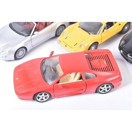 313 - A collection of x10 assorted 1/18 scale loose diecast model cars by makers Maisto, Jadi, Majorette, ... 