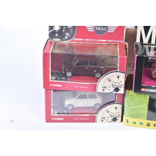 319 - A collection of assorted boxed diecast model cars and other vehicles of various scales and makers. E... 