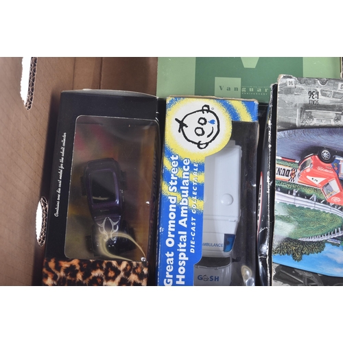 319 - A collection of assorted boxed diecast model cars and other vehicles of various scales and makers. E... 