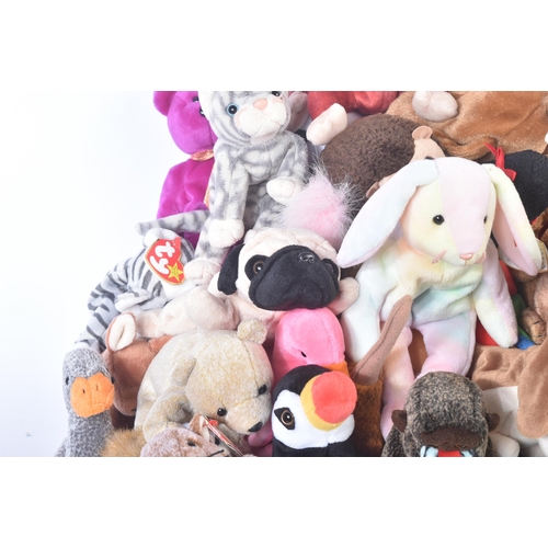 334 - A large collection of vintage collectible TY Beanie Babies to include; Clubby, Jabber, Honks, Cheeks... 