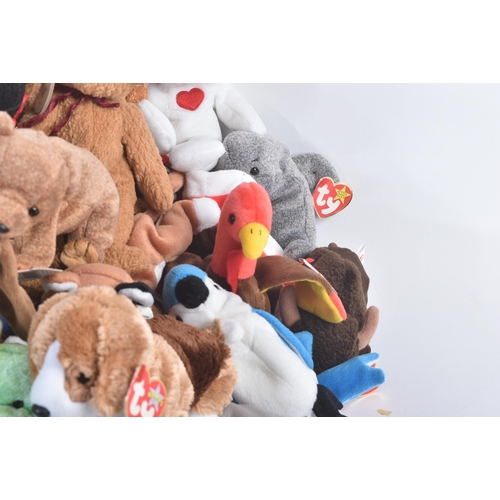 334 - A large collection of vintage collectible TY Beanie Babies to include; Clubby, Jabber, Honks, Cheeks... 