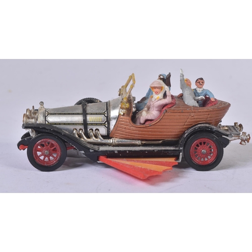 An original vintage Corgi Toys diecast model No. 266 Chitty Chitty Bang Bang car. The car having bro