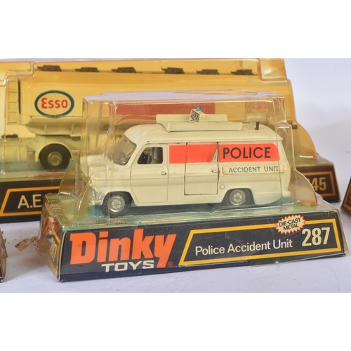 355 - A collection of x4 vintage Dinky Toys boxed diecast models comprising; 945 A.E.C Fuel Tanker Esso, 1... 