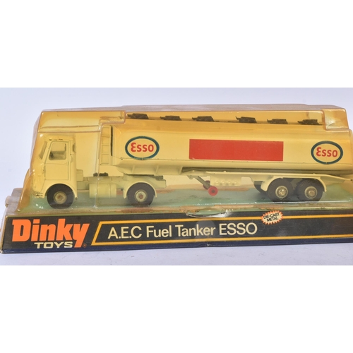 355 - A collection of x4 vintage Dinky Toys boxed diecast models comprising; 945 A.E.C Fuel Tanker Esso, 1... 