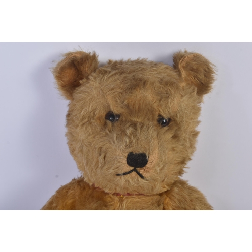 358 - A vintage English, likely Chad Valley or Chiltern made, soft toy teddy bear. The bear firmly stuffed... 