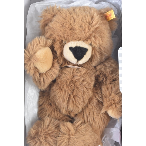 369 - A collection of x3 soft toy teddy bears comprising; Steiff 013393 ' Manschli ' a brown plush example... 