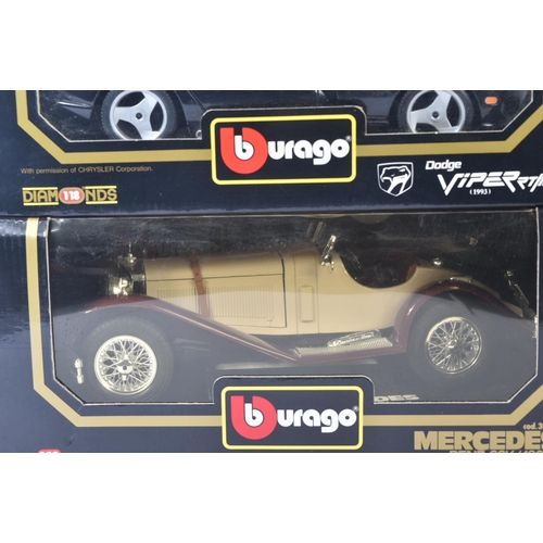 383 - A collection of x8 Burago / Bburago 1/18 scale boxed diecast model cars. Examples to include; Dodge ... 