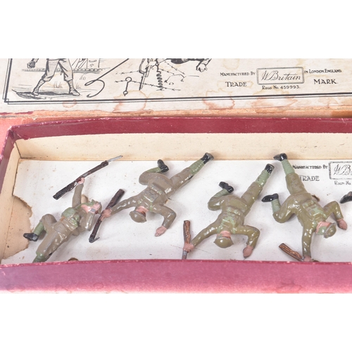 391 - A collection of vintage Britain's lead toy soldier figurines comprising; British Infantry with gas m... 