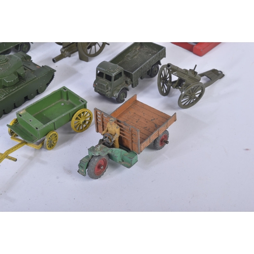 456 - A collection of vintage Dinky Toys diecast model vehicles of Military interest to include; 660 Tank ... 