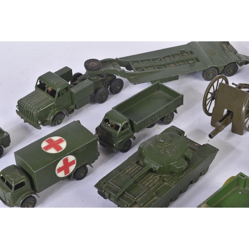 456 - A collection of vintage Dinky Toys diecast model vehicles of Military interest to include; 660 Tank ... 