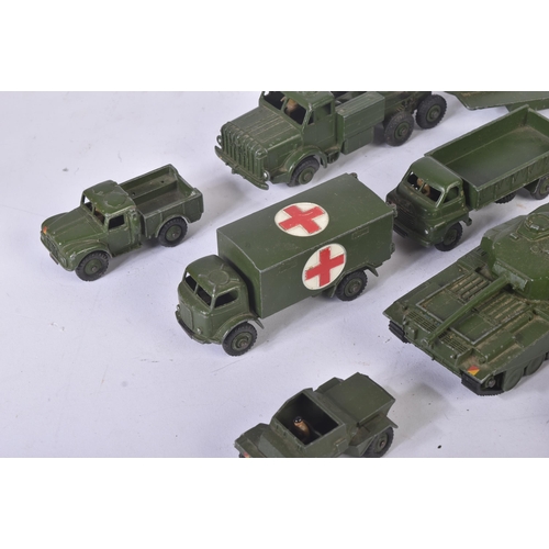 456 - A collection of vintage Dinky Toys diecast model vehicles of Military interest to include; 660 Tank ... 