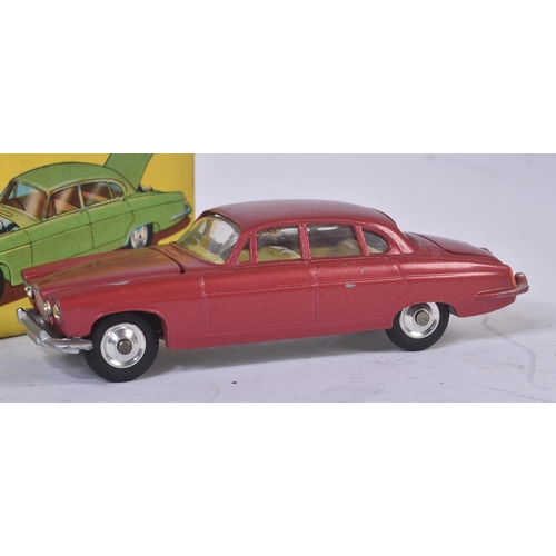 46 - An original vintage Corgi Toys boxed diecast model No. 238 Jaguar Mark X. Metallic red body with lem... 