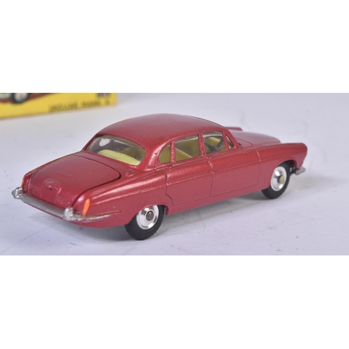 46 - An original vintage Corgi Toys boxed diecast model No. 238 Jaguar Mark X. Metallic red body with lem... 