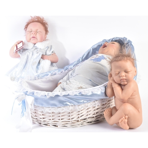 473 - Dolls - a collection of x3 'Lifelike' baby dolls, including: an Ashton Drake ' Baby Grace ', a 'newb... 