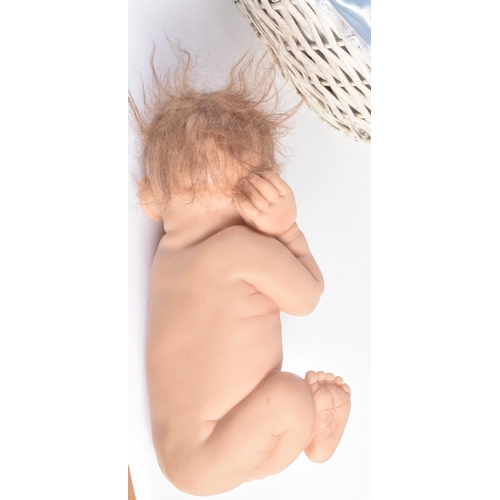 473 - Dolls - a collection of x3 'Lifelike' baby dolls, including: an Ashton Drake ' Baby Grace ', a 'newb... 