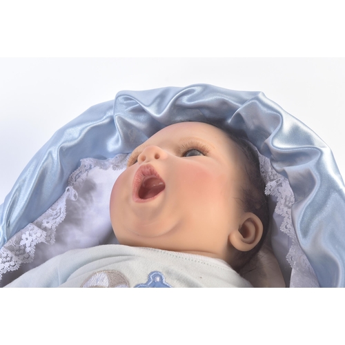 473 - Dolls - a collection of x3 'Lifelike' baby dolls, including: an Ashton Drake ' Baby Grace ', a 'newb... 