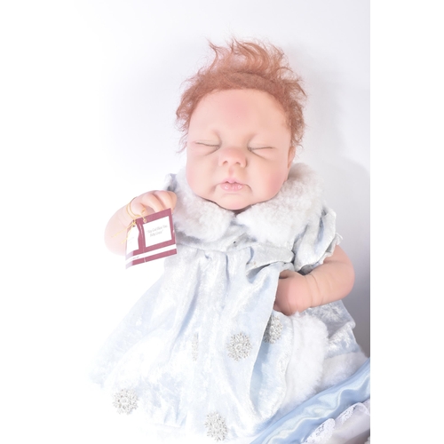 473 - Dolls - a collection of x3 'Lifelike' baby dolls, including: an Ashton Drake ' Baby Grace ', a 'newb... 