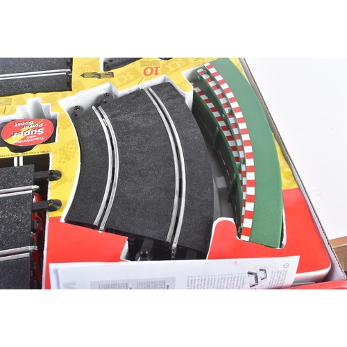 477 - A Spanish made ( Tecni Toys ) Scalextric style slot car racing set RAC Rally. The set containing x2 ... 