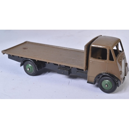 5 - An original vintage Dinky Supertoys boxed diecast model No. 512 Guy Flat Truck. Brown body with blac... 