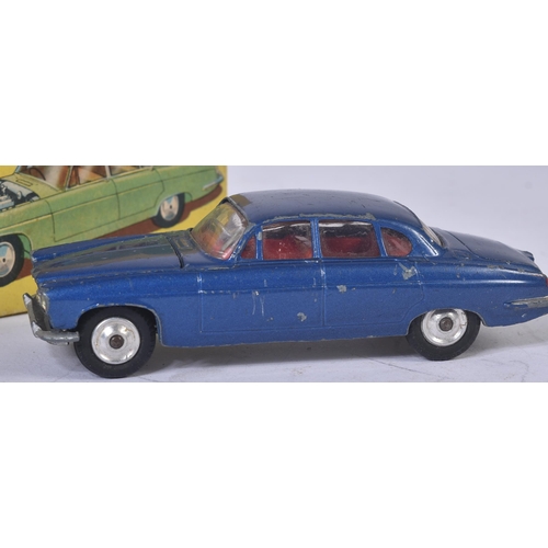 52 - An original vintage Corgi Toys boxed diecast model No. 238 Jaguar Mark X. Metallic dark blue body wi... 