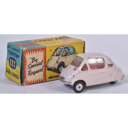 56 - An original vintage Corgi Toys boxed diecast model No. 233 Heinkel Economy Car. Light pink body with... 