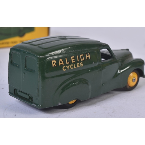 72 - An original vintage Dinky Toys boxed diecast model No. 472 Austin Van Raleigh Cycles. Dark green bod... 