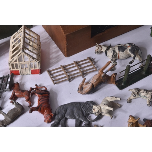 73 - A large collection of vintage Britain's lead toy farm and zoo animals along with a selection of asso... 