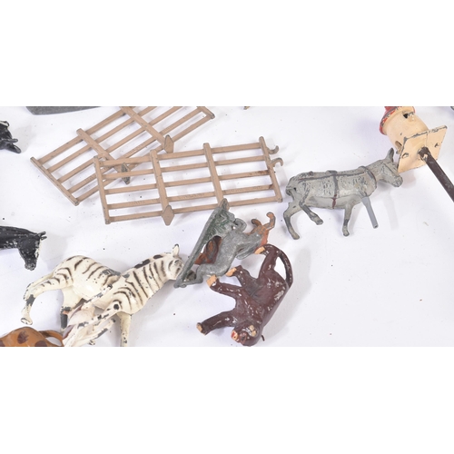 73 - A large collection of vintage Britain's lead toy farm and zoo animals along with a selection of asso... 