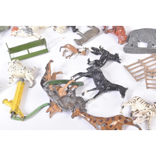 73 - A large collection of vintage Britain's lead toy farm and zoo animals along with a selection of asso... 