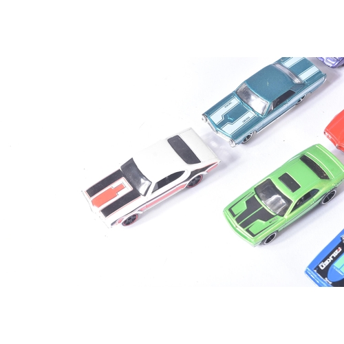 85 - A collection of assorted vintage loose diecast model cars, largely Mattel made Hot Wheels along with... 