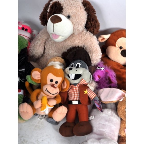 93 - Teddy Bears - a collection of x 25 assorted teddy bears / plush toys to include: Perro, The Smurfs, ... 