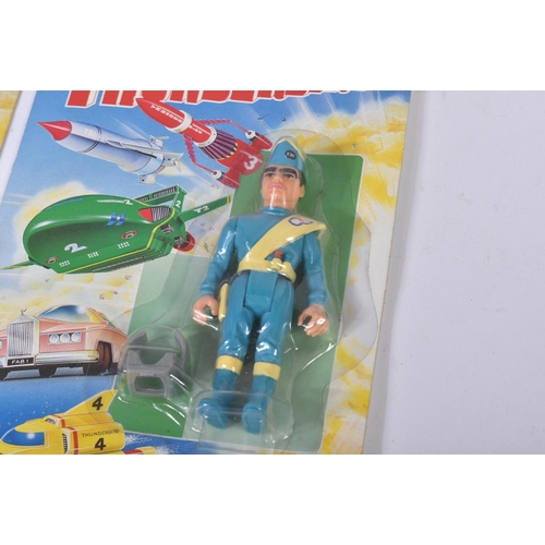 522 - A collection of x7 vintage Matchbox Thunderbirds action figures and vehicles comprising; x3 pull bac... 