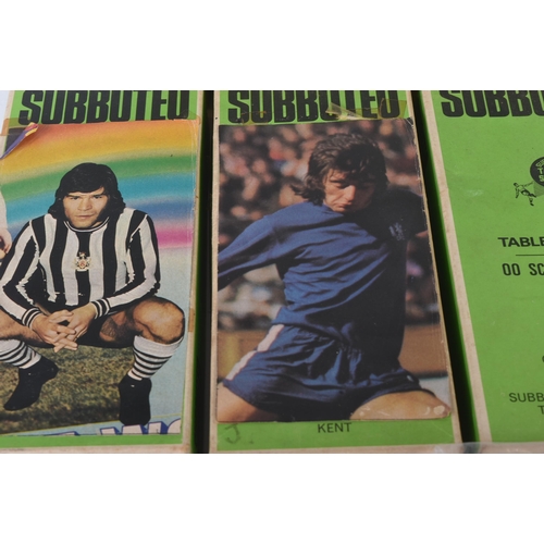 581 - A collection of vintage Subbuteo tabletop football teams and empty boxes. The figures appearing ligh... 