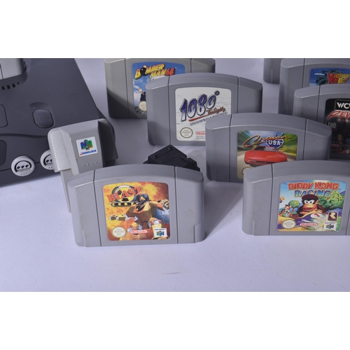 615 - Retro Gaming - a vintage N64 Nintendo 64 video game console with a selection of games and rumble pak... 