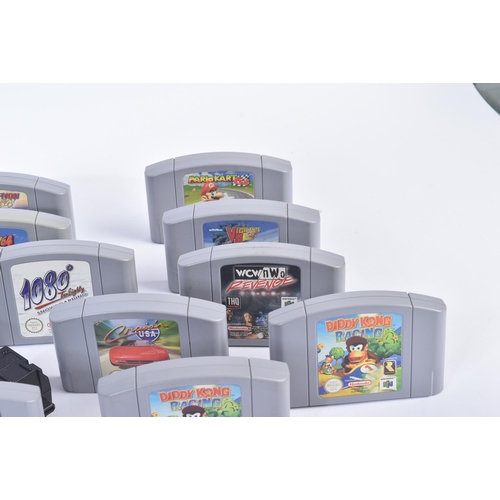 615 - Retro Gaming - a vintage N64 Nintendo 64 video game console with a selection of games and rumble pak... 