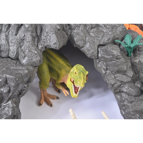 620 - An original Schleich made playset No. 42305 Giant Volcano with Dinosaurs. The set comprising large s... 