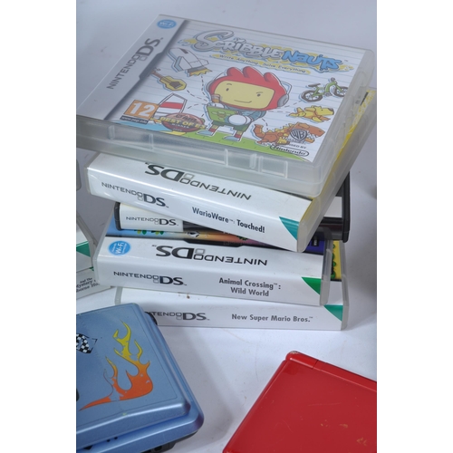 625 - Retro Gaming - Nintendo DS - a collection of handheld video games consoles, boxed and unboxed games ... 