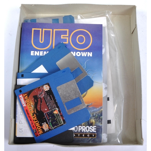 632 - Retro Gaming - two vintage big box Commodore Amiga computer video games comprising; UFO Enemy Unknow... 