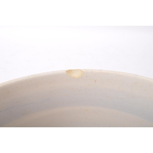 112 - T. G. Green - An early 20th century china T. G. Green Cornish ware mixing bowl with butter bowl. Mea... 