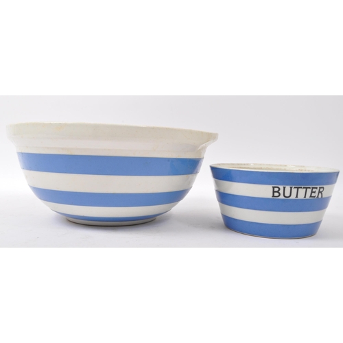 112 - T. G. Green - An early 20th century china T. G. Green Cornish ware mixing bowl with butter bowl. Mea... 