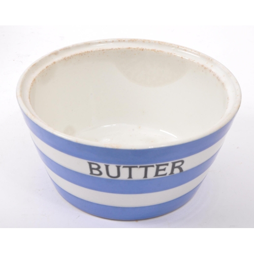 112 - T. G. Green - An early 20th century china T. G. Green Cornish ware mixing bowl with butter bowl. Mea... 