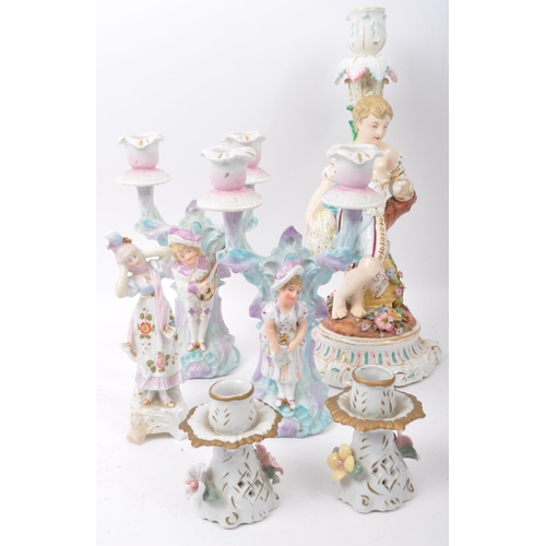 44 - A collection of vintage 20th Century Sitzendorf style porcelain china figurines and candle candelabr... 